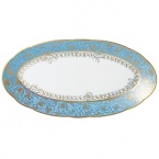 Inspired by the flamboyant designs of the 19th century, Eden Turquoise is both refined and sophisticated. This Limoges porcelain dinnerware service is a remarkable reproduction that captures the beauty of engraved gold work. Made in Limoges, France.