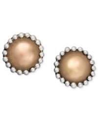 Simple studs with an extra edge. Set in sterling silver and 18k gold over sterling silver, these stud earrings by Jody Coyote offer a unique beaded design at the edges. Approximate diameter: 1/8 inch.