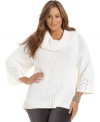 Cozy up to the chic comfort of Style&co.'s three-quarter-sleeve plus size sweater, finished by a cowl neckline and cabled front.