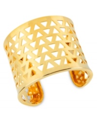 Three sides to pure style. This Robert Lee Morris cuff bracelet boasts triangle cut-out detail for standout appeal. Crafted in gold tone mixed metal. Approximate diameter: 3 inches.