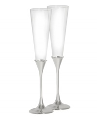 Combining beautiful crystal and embellished silver plate, Lismore Bead toasting flutes commemorate happy milestones in quintessential Waterford style.