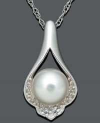 Proper etiquette. This prim and poised pendant features a timeless, diamond-accented teardrop design cradling a cultured freshwater pearl (7-8 mm). Set in sterling silver. Approximate length: 18 inches. Approximate drop: 3/4 inch.