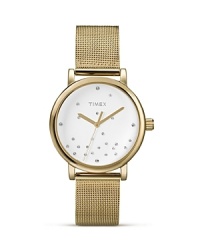 Timex's functional, industrial design gets dressed up in brushed metal plate with a scattered Swarovski crystal dial, punctuated by a mesh bracelet. Wear this piece for starry style.