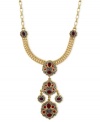 Eclectic appeal. This pendant necklace from Jessica Simpson is crafted from gold-tone mixed metal with faceted red stones adding a fashion infusion. Approximate length: 26 inches. Approximate drop: 3 inches.