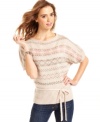 Cute is the name of the game with this belted, fair-isle pattern pullover from Sweater Project!