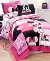 Pretty in pink! Enjoy sweet dreams every night with these decorative pillows from Disney, featuring a pink, black and white color scheme with ruffle and embroidered accents.