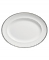 Vera Wang marries modern shapes with traditional lace in this set of dinnerware. The dishes are decidedly timeless. Platinum trim and banding add delicate feminine touches to this white oval platter.