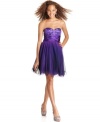 This dreamy dress from Jump features glittery sequins and a tulle skirt for a total princess effect!