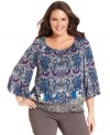 Enliven your neutral bottoms with Style&co.'s three-quarter-sleeve plus size top, featuring a vibrant print. (Clearance)