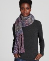 For supreme warmth and style, wrap up in UGG® Australia's chunky, space dyed scarf with long, twisted fringe edges.