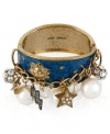 Quite striking. With lightning bolt and star baubles with glass crystal accents, as well as glass pearls, Betsey Johnson's bangle bracelet-crafted from gold-tone mixed metal-makes a stunning statement. Approximate diameter: 2-1/4 inches.