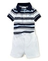 A short-sleeved striped polo shirt pairs with an ultra-soft cotton mesh pant for a comfortable, preppy look.