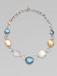 From the Wonderland Collection. Shapely doublets in rich tones of honey and denim combine color-backed mother-of-pearl and faceted clear quartz, spaced along with uncolored stones on a bold sterling silver chain.Mother-of-pearl and clear quartzSterling silverLength, about 18Toggle claspImported