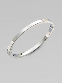 A sleek steel design with squared-off angles makes this piece perfectly versatile. SteelDiameter, about 2¼Hinged push clasp closureImported 