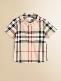 Fashioned in the renowned check design, this breezy cotton button-down features a shirttail hem and patch pocket.Button-down collarShort sleevesButton-frontFront patch pocketShirttail hemCottonMachine washImported Please note: Number of buttons may vary depending on size ordered. 