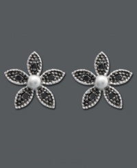 Bonus Buy: Black Diamond Accent Flower Earrings Just $79 with any jewelry purchase (Reg. $250). Earrings are crafted in 14k white gold with black diamond-accented flower petals. Approximate diameter: 1/4 inch.