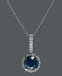 A touch of royalty. EFFY Collection's stunning drop pendant features a large round-cut blue diamond (3/4 ct. t.w.) surrounded by smaller, round-cut white diamonds (7/8 ct. t.w.). Crafted in 14k white gold. Approximate length: 18 inches. Approximate drop: 1 inch.