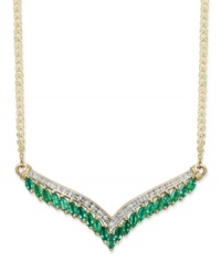 Enhance the glamour of an elegant v-neck gown. This v-shaped pendant necklace is adorned by marquise-cut emeralds (1-1/2 ct. t.w.) and a seamless row of round-cut diamonds (1/7 ct. t.w.). Crafted in 14k gold. Approximate length: 18 inches. Approximate drop length: 1 inch. Approximate drop width: 2-7/8 inches.