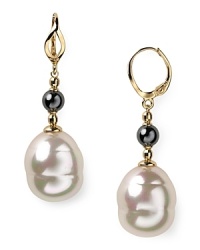 These gold vermeil drop earrings with pearls from Majorica are a staple for your jewelry box. For any occasion or event, they'll be your go-to.