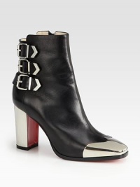 Buckle straps and a metal wing-tip modernize this expertly crafted ankle boot of supple leather. Lacquered heel, 3½ (90mm)Leather upper with metal wing-tipSide zip and buckle strapsLeather liningSignature red leather solePadded insoleMade in Italy