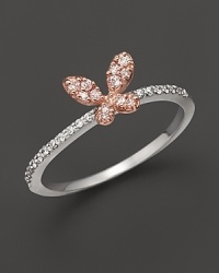 A dainty diamond butterfly ring set in 14K. rose and white gold.