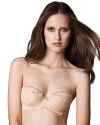 A pretty molded cup strapless bra with floral lace detail all over. Style #E74-696