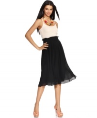 Take your look to new lengths this season with MM Couture's pleated midi skirt!