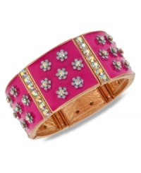 Flower power. Betsey Johnson's slip-on stretch bracelet features a pink design decorated with flowers and crystal accents. Set in antiqued gold tone mixed metal. Approximate length: 7-1/2 inches. Approximate width: 1 inch.