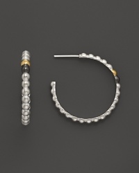 Single 24K gold and dark silver details lend intrigue to Gurhan's sterling silver Cous Cous hoops.