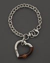 Sterling silver and bamboo heart charm bracelet by Gucci.