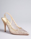 These scintillating slingback evening pumps by kate spade new york feature sheerly sensational uppers with gold glitter dots, in a design that's vintage, modern and timeless.