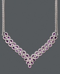 Envelope your neckline in lustrous gemstones. Two rows of vibrant oval-cut amethyst (14 ct. t.w.) are set in polished sterling silver with a double chain design. Approximate length: 11 inches.