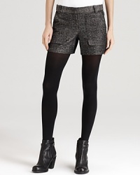 Layered with tights and finished with a classic fall bootie, these mini metallic BCBGMAXAZRIA shorts take fall by storm and chic new lengths.