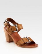 Oversized buckles and an adjustable slingback strap characterize this supple leather design. Stacked heel, 3 (75mm)Leather upperLeather lining and solePadded insoleImportedOUR FIT MODEL RECOMMENDS ordering one half size up as this style runs small. 