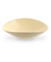 From celebrated chef and writer, Sophie Conran, comes incredibly durable dinnerware for every step of the meal, from oven to table. A ribbed texture gives this salad bowl the charming look of traditional hand-thrown pottery.