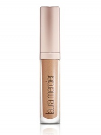 A high-shine, perfectly pigmented lip gloss with rich, long-lasting colour and brilliant shine that creates the appearance of fuller lips. Any skin tone is virtually enhanced by creating a subtle contrast in texture. With the unique blendof moisturizing, anti-aging, anti-oxidant and plumping ingredients provided by the Laura Mercier Lip Complex, the non-sticky gloss formula applies smoothly without feathering or bleeding. 