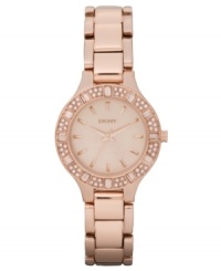 The picture of feminine grace, this rosy watch from DKNY glitters with pretty crystal accents.