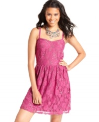 Flourished with metallic accents and a sweet, floral pattern, this sleeveless party dress from BeBop totally charms.