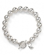 Shine in Lauren Ralph Lauren's gleaming silver bead bracelet.