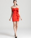 A cascading ruffle infuses this fiery-hued Jay Godfrey strapless dress with chic femininity.