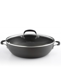 Your go-to in the kitchen! A hard-anodized exterior and nonstick interior provides the perfect space for sauteing, simmering, browning and preparing entire meals. Even faster clean-up and even smarter, healthier cooking is all yours with the versatility of this do-it-all pan. 10-year warranty.