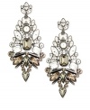 Break the glass ceiling on fashion with this pair of chandelier earrings from Givenchy. Crafted from brown gold-tone mixed metal with glass stones adding luster. Approximate drop: 4-1/2 inches.