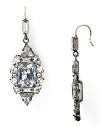 Stone clusters and hematite plated metal lend an edge to this pair of Juicy Couture drop earrings. Make these your punk-pretty choice.