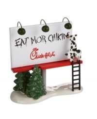 All signs point to a Chick-fil-A Christmas, including this billboard in Snow Village. The cows know – chikin is where it's at when it comes to a delicious holiday meal. Coordinates with the also-irresistible Chick-fil-A restaurant building by Department 56.