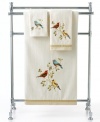 A touch of Spring. Featuring intricately embroidered birds on pure cotton, Avanti's Gilded Birds bath towel accents your space with an air of elegance perfect in any season. Sheared velour face; terry reverse. Finished with two-tone ribbon trim.