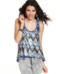 Give your trusty jeans the ultimate pick-me-up with this super shimmery, sequin racerback tank top from Eyeshadow!