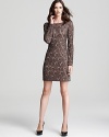 Beaded lace exudes an ornate look on this oh-so-sophisticated Aidan Mattox dress, demure in a long sleeved silhouette.