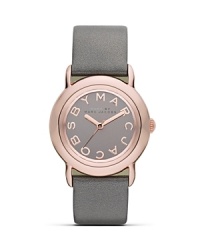 MARC BY MARC JACOBS recasts the classic workday watch in a covetable shade of gray. Wear this cloudy-colored chronograph to trim on-trend tailoring in timeless style.