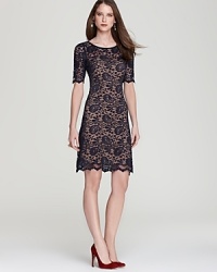 Evoke an effortless sense of romance in a lace Karen Kane lace dress featuring scalloped trim for a demure yet dramatic look.