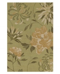 A delicate bouquet of florals pops against a moss-green ground, bringing beauty to every outdoor floor. This indoor/outdoor area rug from Dalyn is crafted from hand-hooked polypropylene for superb durability when exposed to the elements.